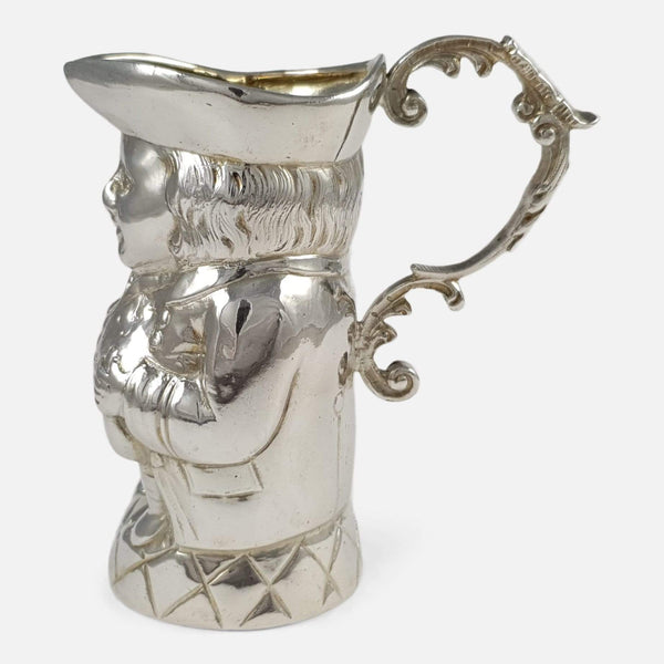 the sterling silver Toby Jug cream jug viewed side on