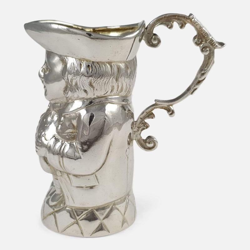 the sterling silver Toby Jug cream jug viewed side on