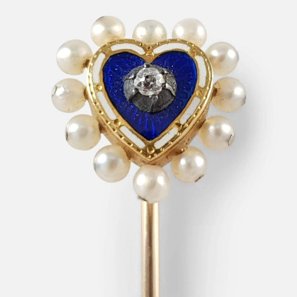 the Edwardian gold, enamel, diamond, & seed pearl heart shaped stick pin in focus