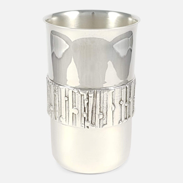 the silver beaker to include the decoration