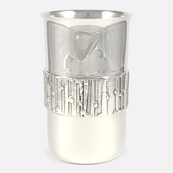 the sterling silver beaker to include the decoration