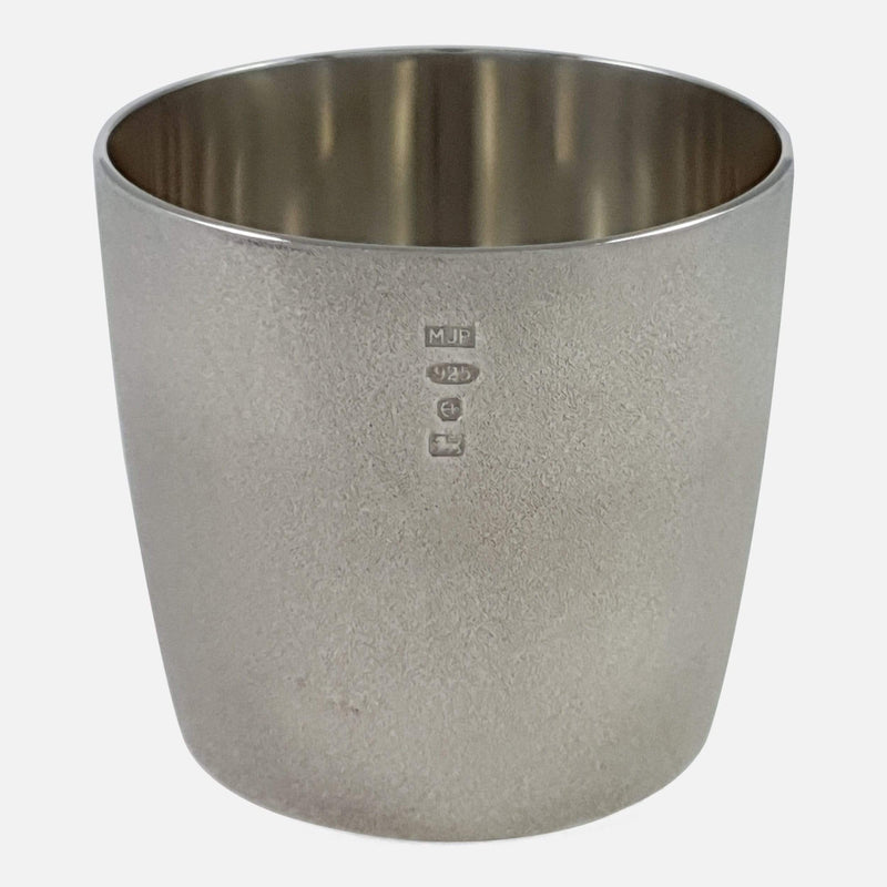 The silver beaker viewed from the front to include Birmingham hallmarks