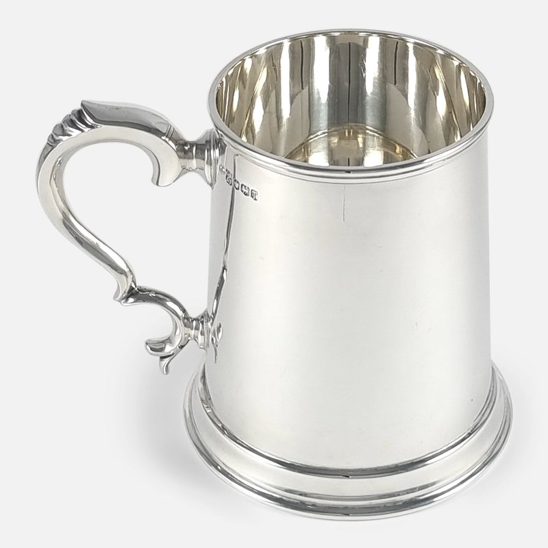 a side on view of the mug with handle pointing left
