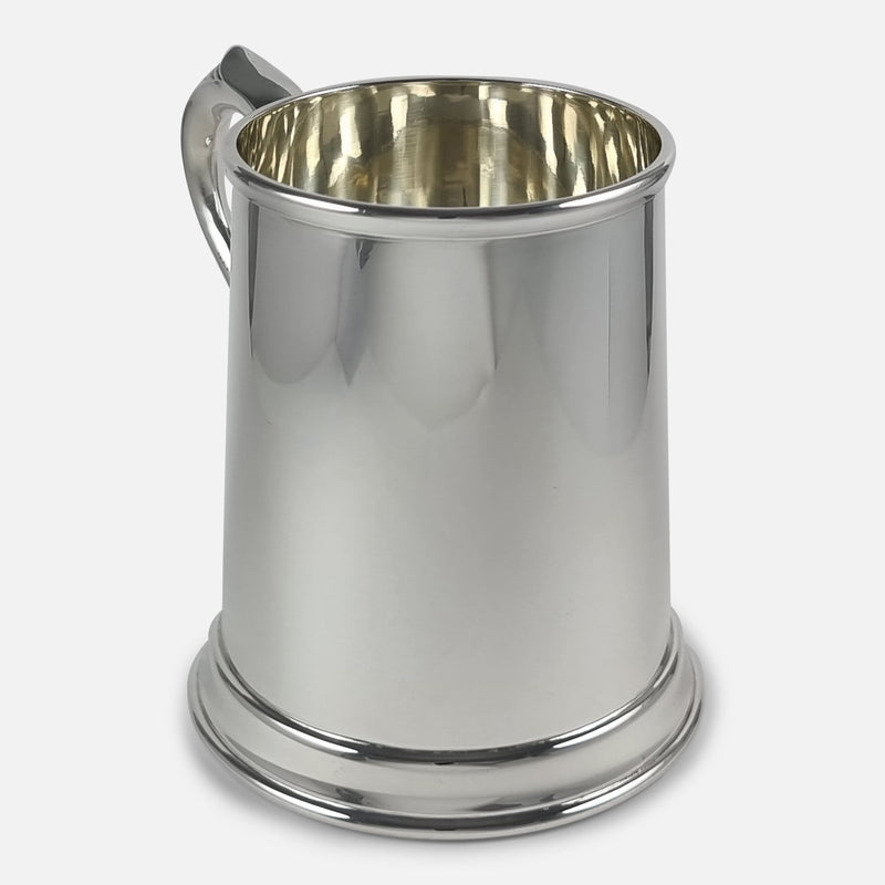 the mug rotated with handle to background and pointing slightly towards the left
