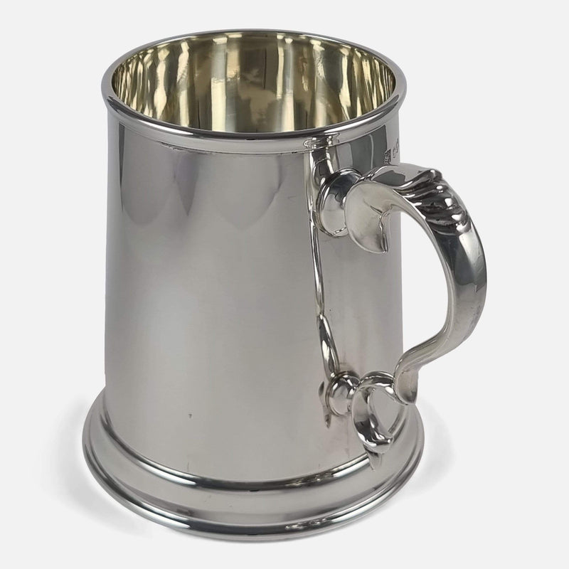 the mug rotated with handle to forefront and pointing slightly towards the right