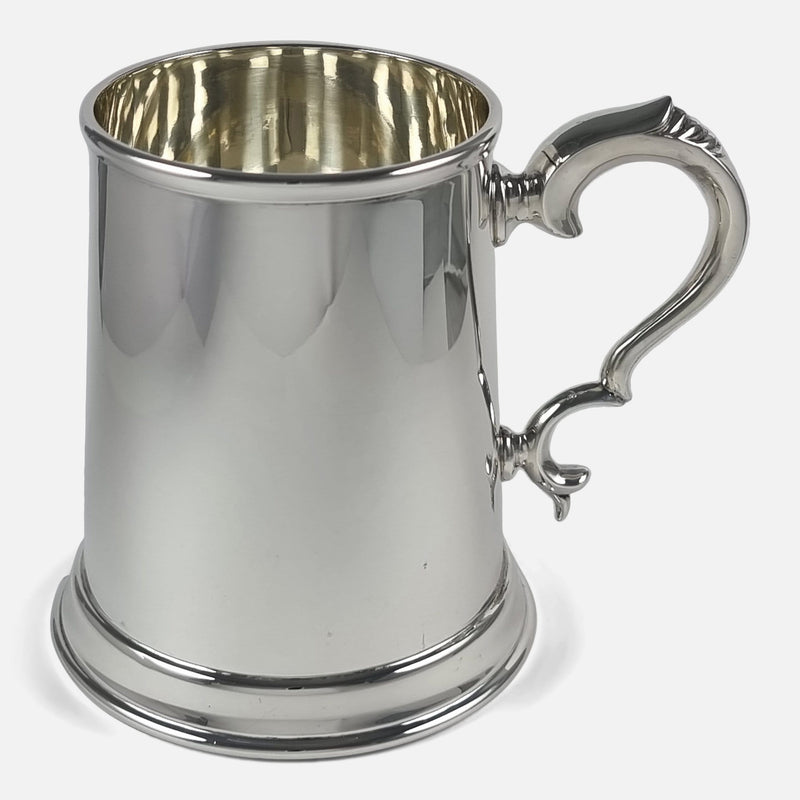 the mug side on with handle pointing towards the right