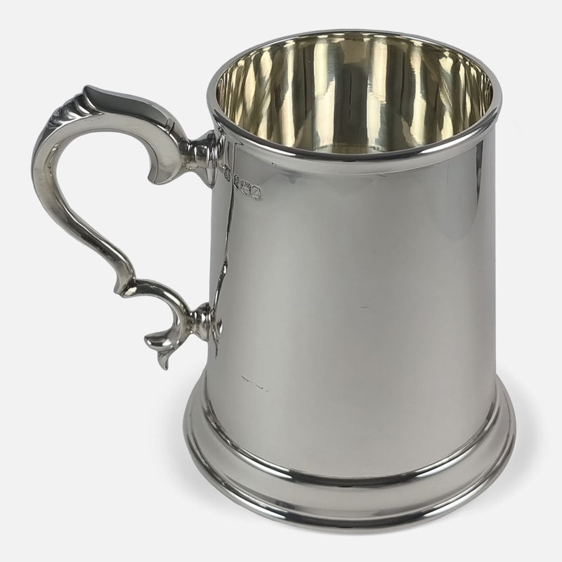 the sterling silver mug in the Georgian style, viewed side on