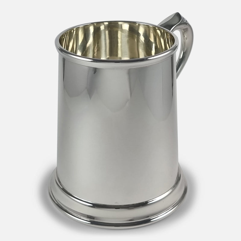 the mug rotated with handle to background and pointing slightly towards the right