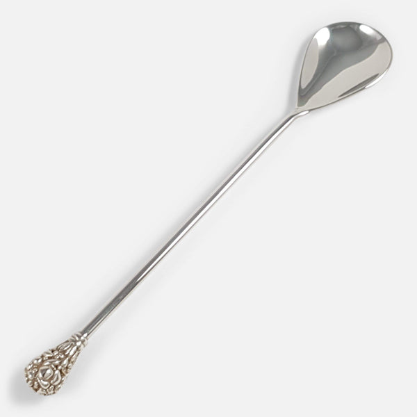 the sterling silver spoon viewed diagonally
