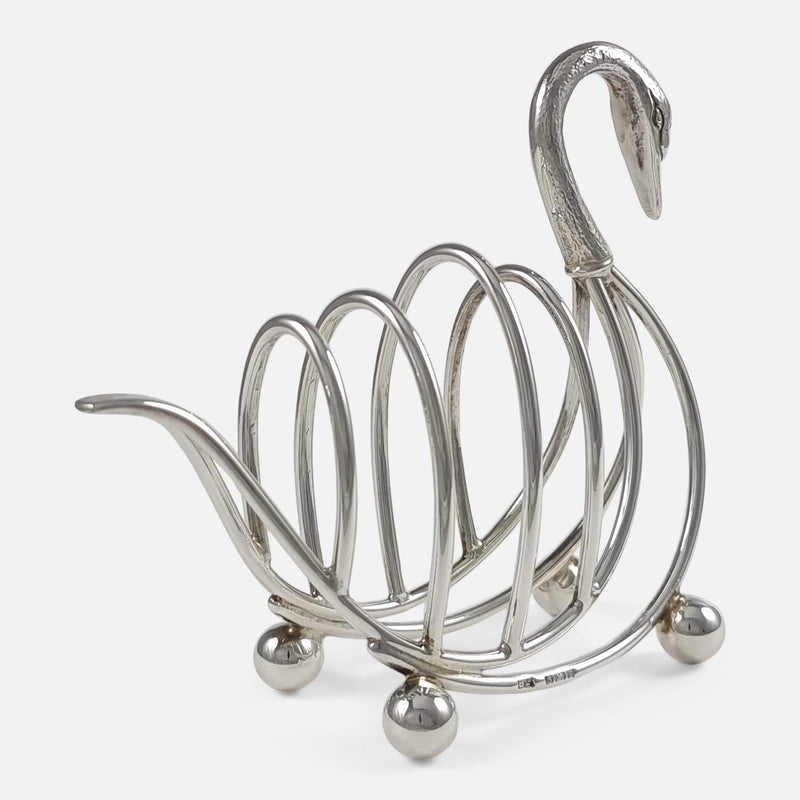 the toast rack with swan head facing backwards and pointing slightly to the right