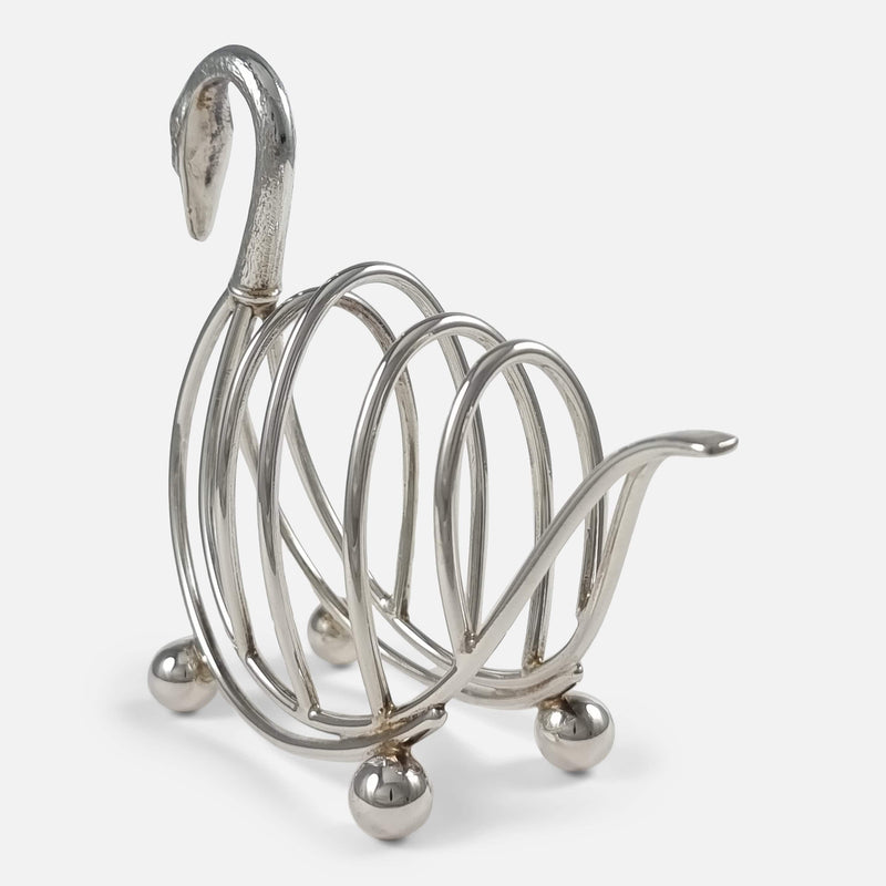 the toast rack with swan head facing backwards and pointing slightly to the left