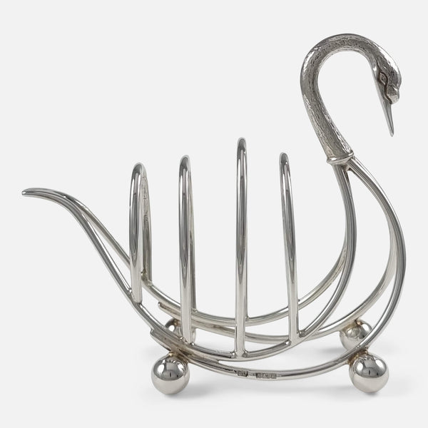 the Elizabeth II sterling silver Swan toast rack viewed side on facing right