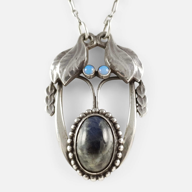 the antique silver opal and labradorite pendant viewed from the front