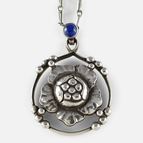 the 1910s silver and lapis lazuli pendant viewed from the front