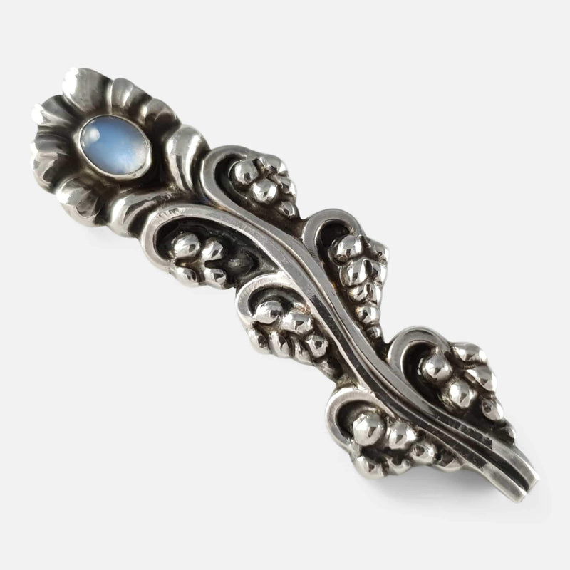 the Georg Jensen silver moonstone foliate brooch viewed diagonally