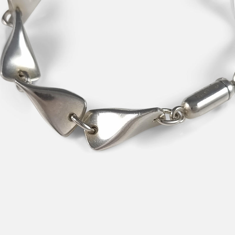 focused on a number of the bracelet links