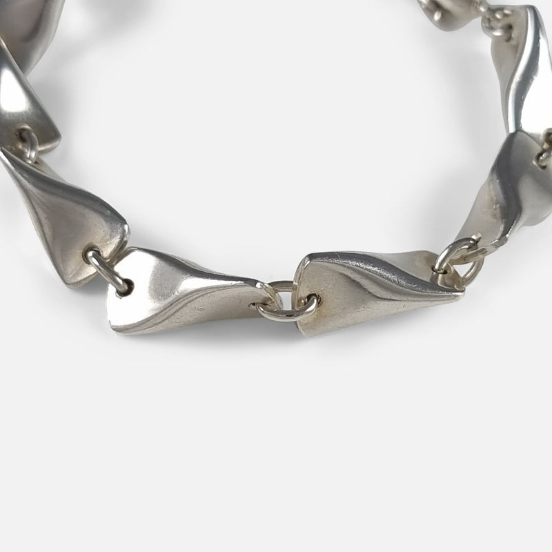 focused on a number of the bracelet links