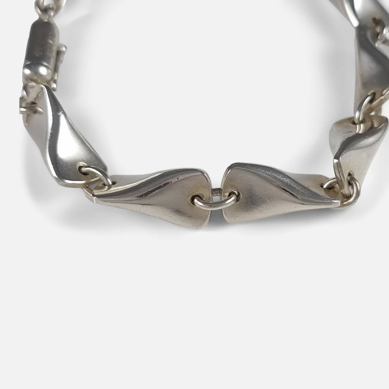 focused on a number of the bracelet links