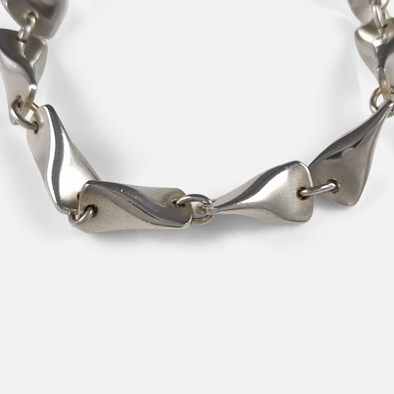 focused on a number of the bracelet links