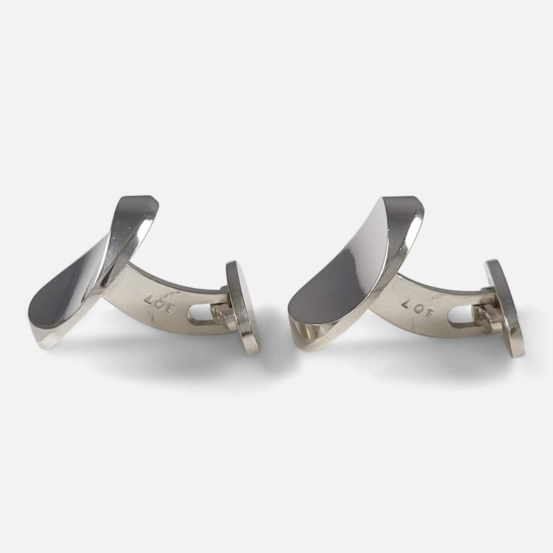a side on view of the cufflinks