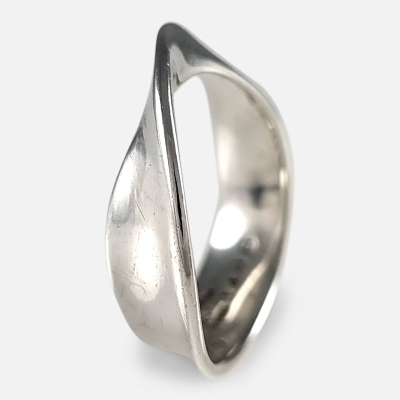 the ring viewed almost side on when stood on one end