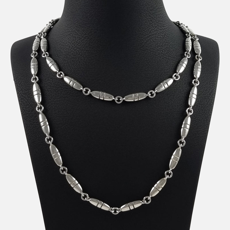 the Georg Jensen sterling silver necklace designed by Lene Munthe, viewed on a display stand