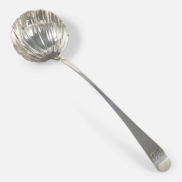 the George III silver soup ladle viewed diagonally