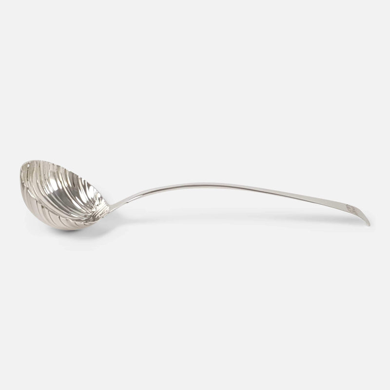 the sterling silver soup ladle viewed side on