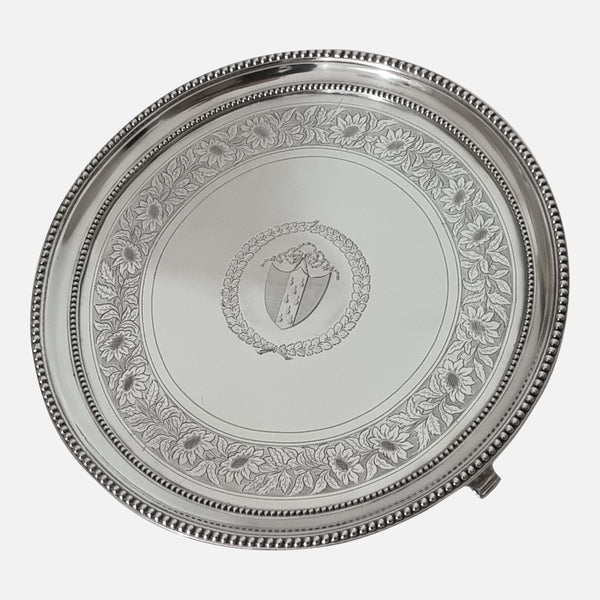 the George III sterling armorial engraved silver salver viewed at a slight angle