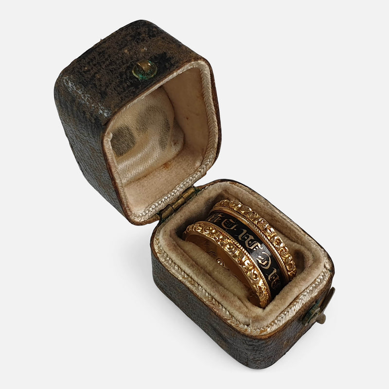 the gold ring viewed in its original box