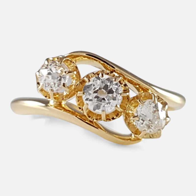 the antique 18ct gold diamond trilogy crossover ring viewed from the front