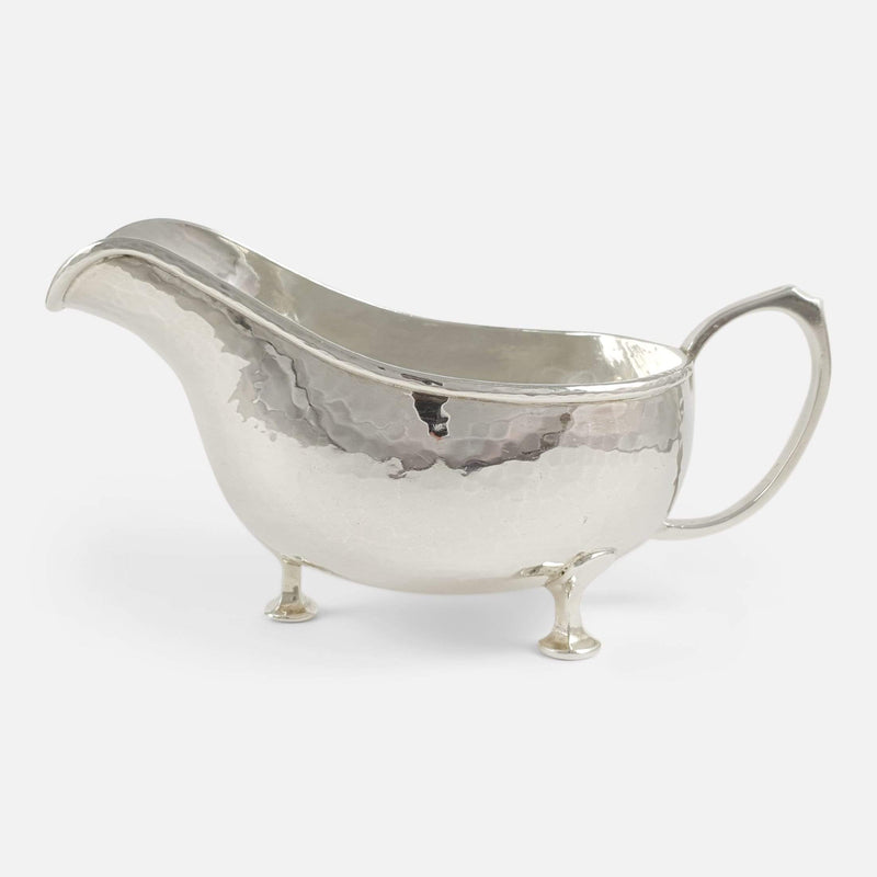 the sterling silver gravy sauce boat viewed side on