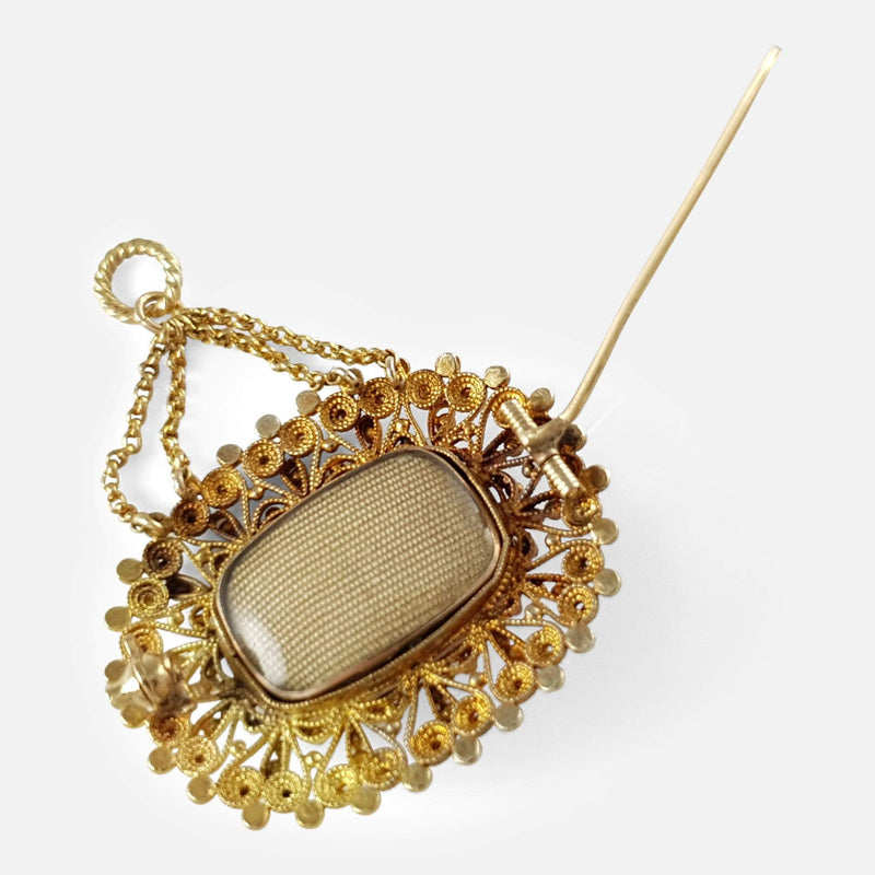 the back of the pendant brooch with clasp opened