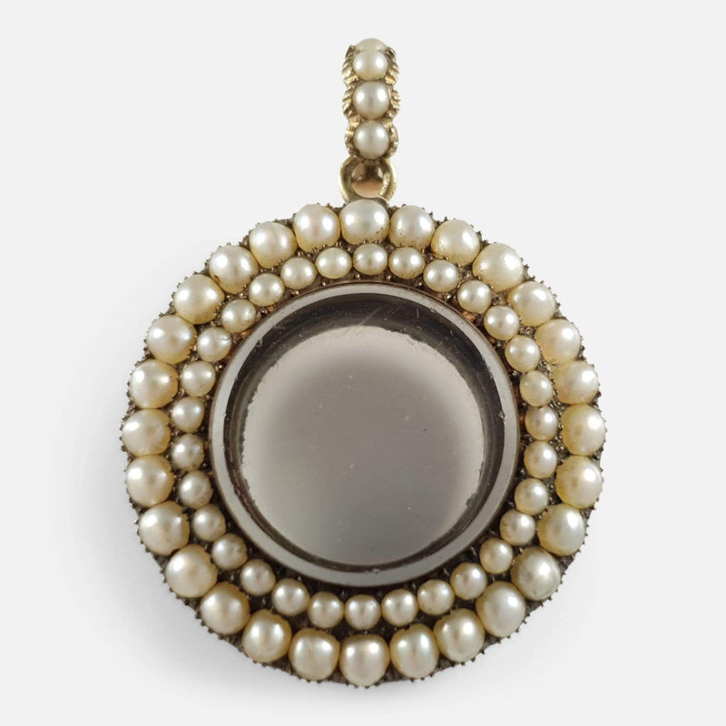 the Georgian 9ct gold and split pearl glazed memorial locket viewed from the front