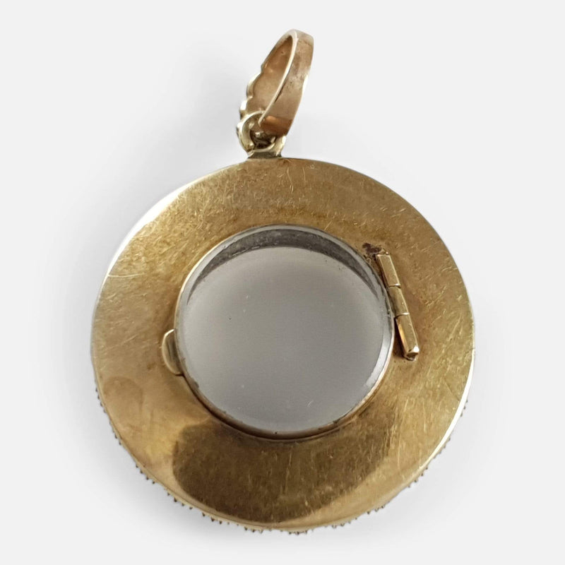 the back of the locket with glazed panel closed