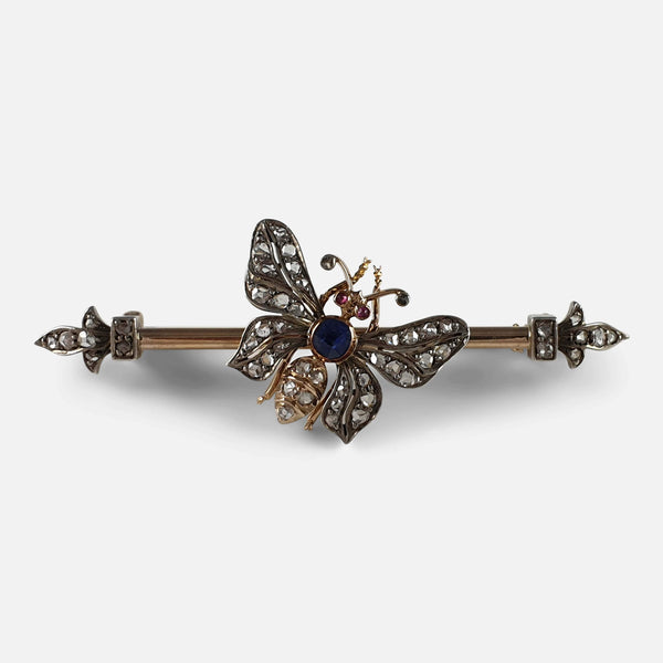 the ruby, sapphire, and diamond butterfly brooch viewed from the front