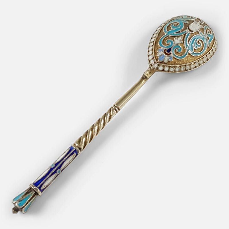 the Russian silver and enamel coffee spoon lying face down