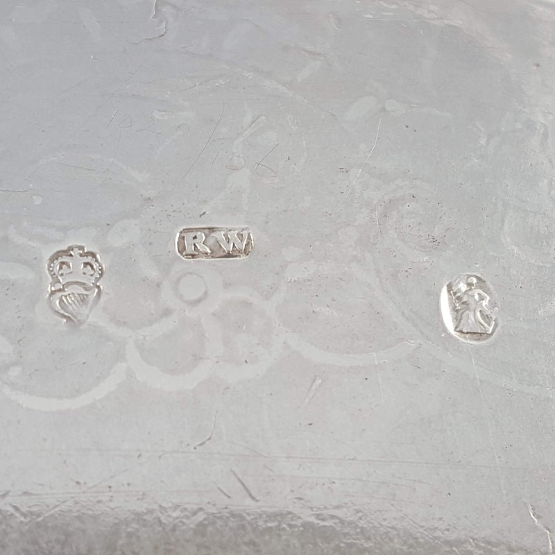 silver hallmarks and makers marks on the back of the salver