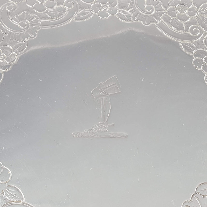 the family crested engraved onto the silver salver