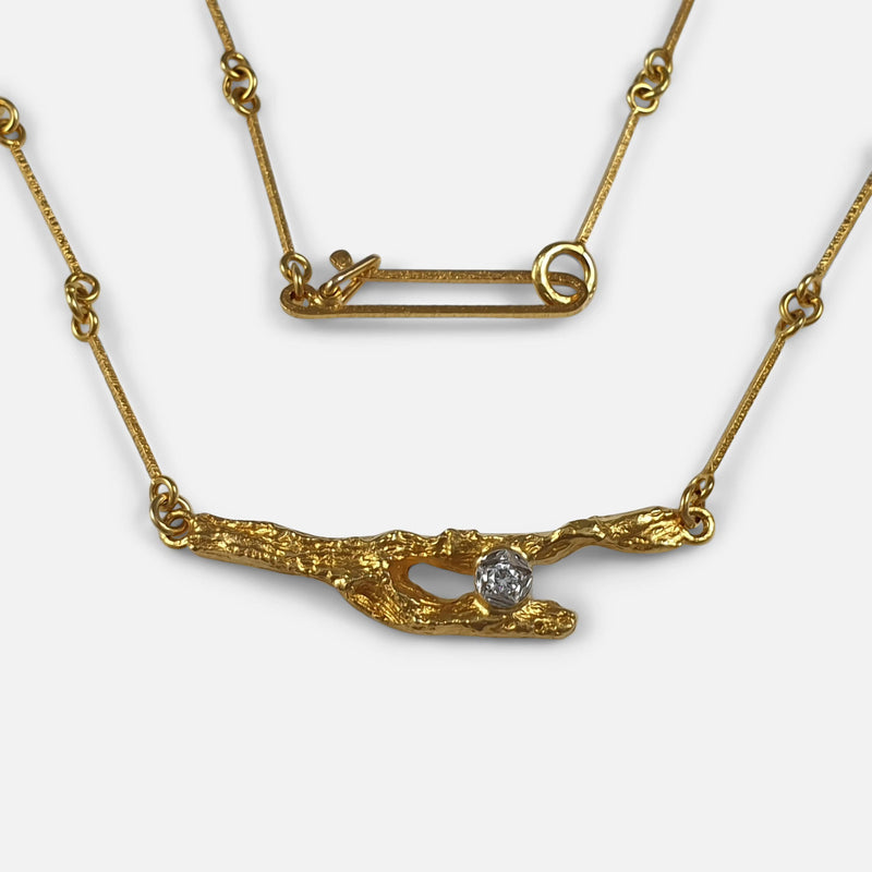 focused on the pendant and clasp