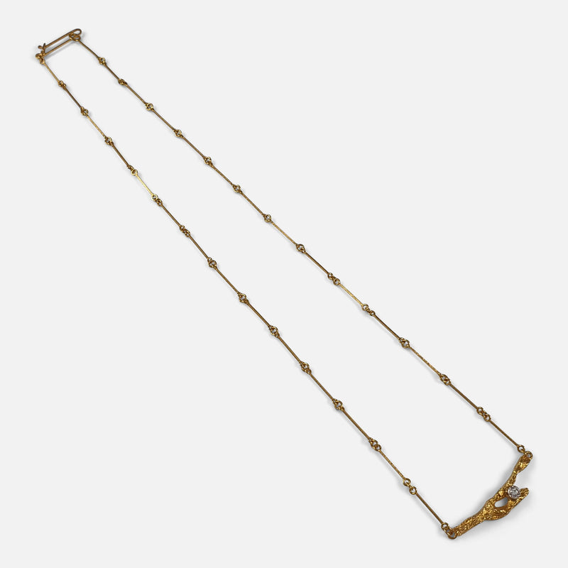 the necklace extended diagonally
