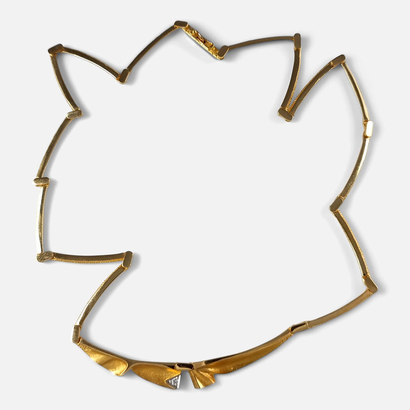 a birds eye view of the gold necklace