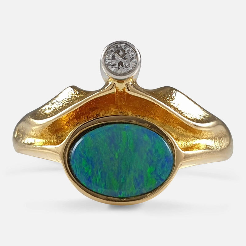 the 18ct gold, diamond, and opal doublet ring viewed from the front