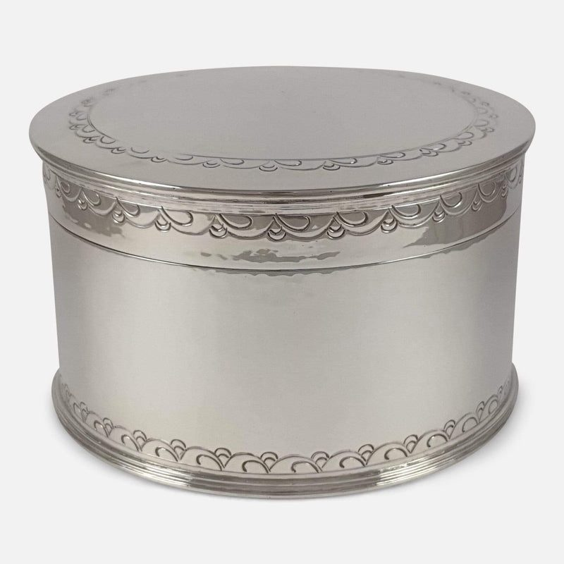 the vintage silver biscuit box viewed from the front