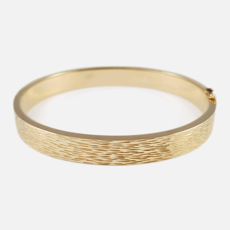 showing the bangle's textured finish