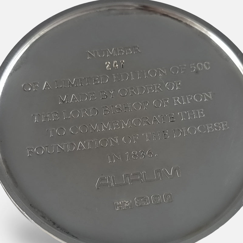 the engraving to the base of one of the goblets