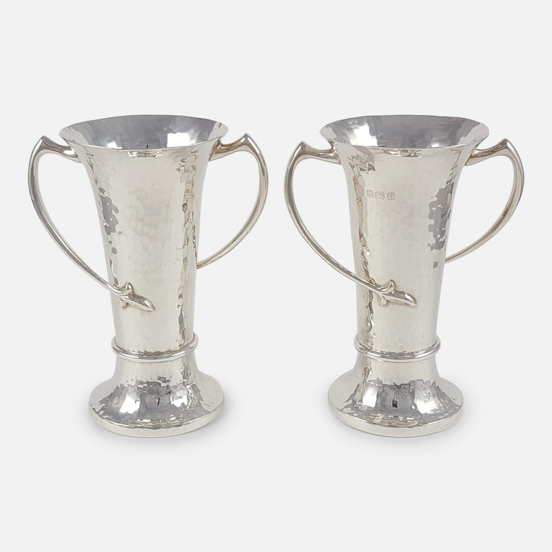 the pair of sterling silver Art Nouveau vases viewed from the front