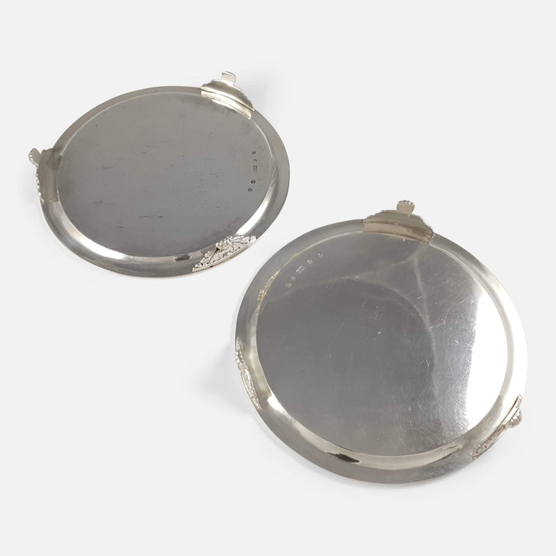 the pair of salvers lying face down