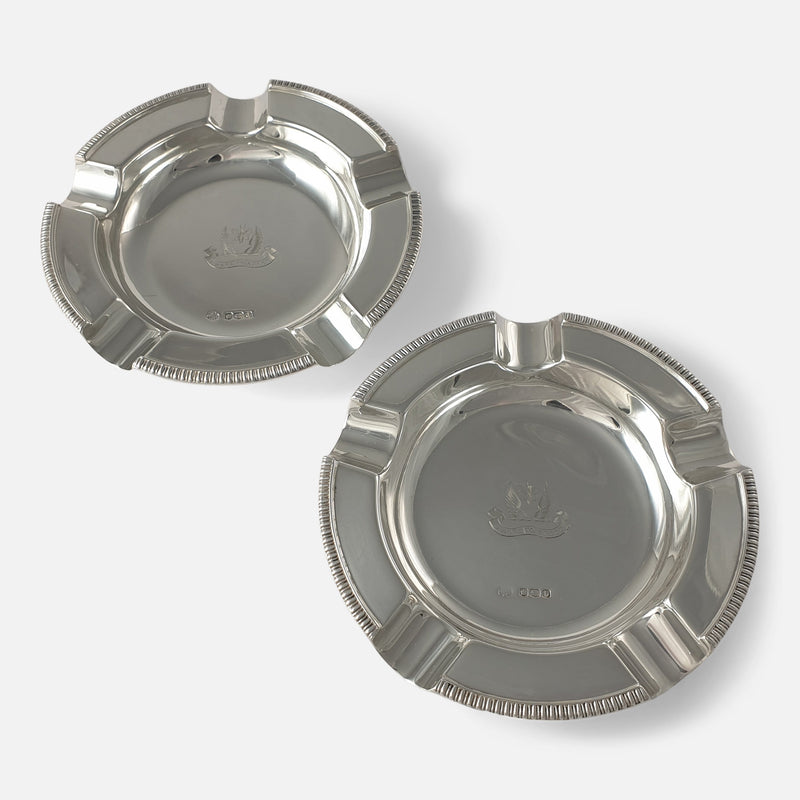 a diagonal view of the pair of ashtrays