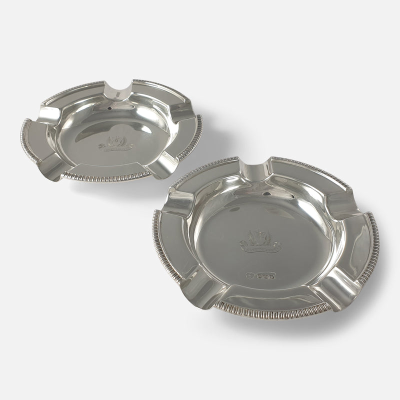 a diagonal view of the pair of ashtrays